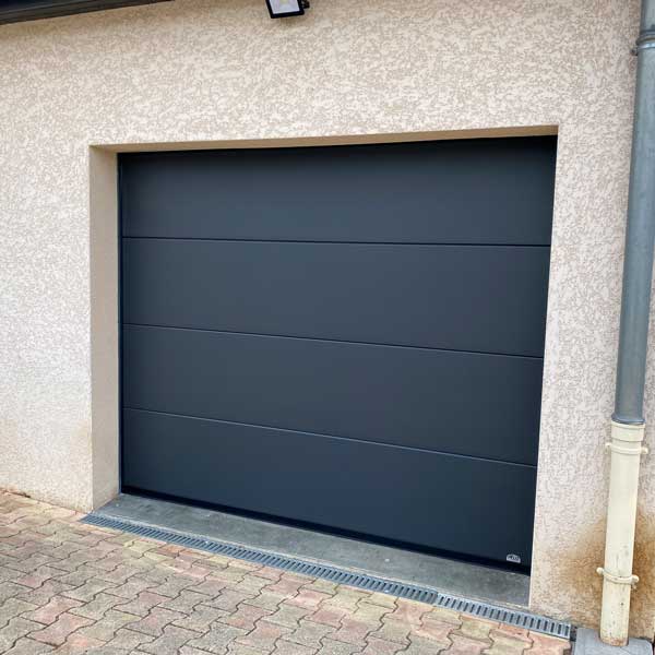 porte de garage sectionnelle Menuiserie Potherat
